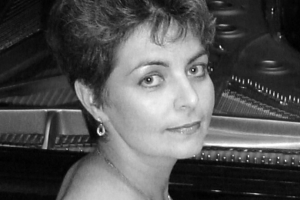 A RENOMADA PIANISTA 